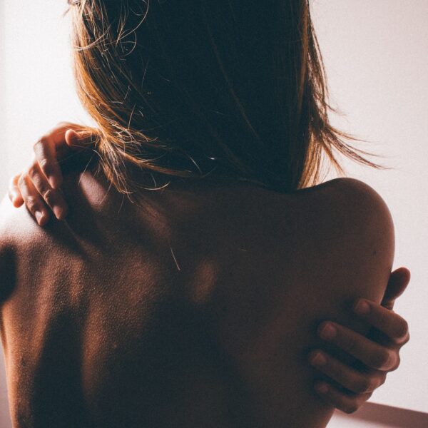 close photo of woman's back