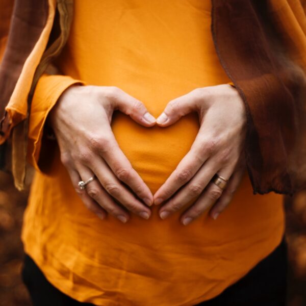 person touching stomach