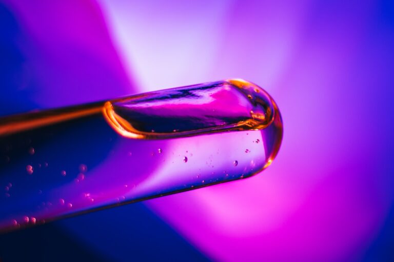 a close up of a purple and blue liquid